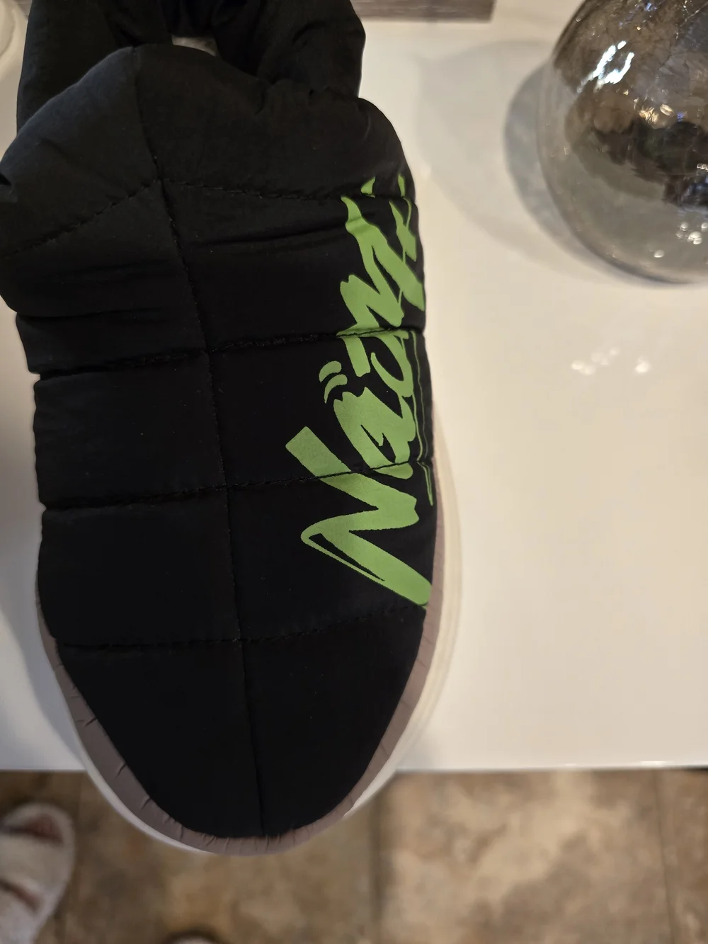 WomenBlack & Green Puffer Slip-On Shoes with Green Logo